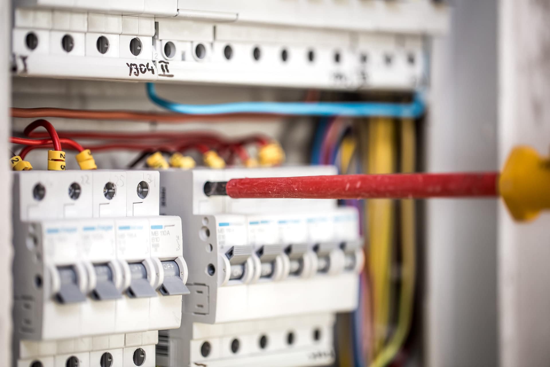 man-an-electrical-technician-working-in-a-switchb-2025-03-14-14-11-48-utc