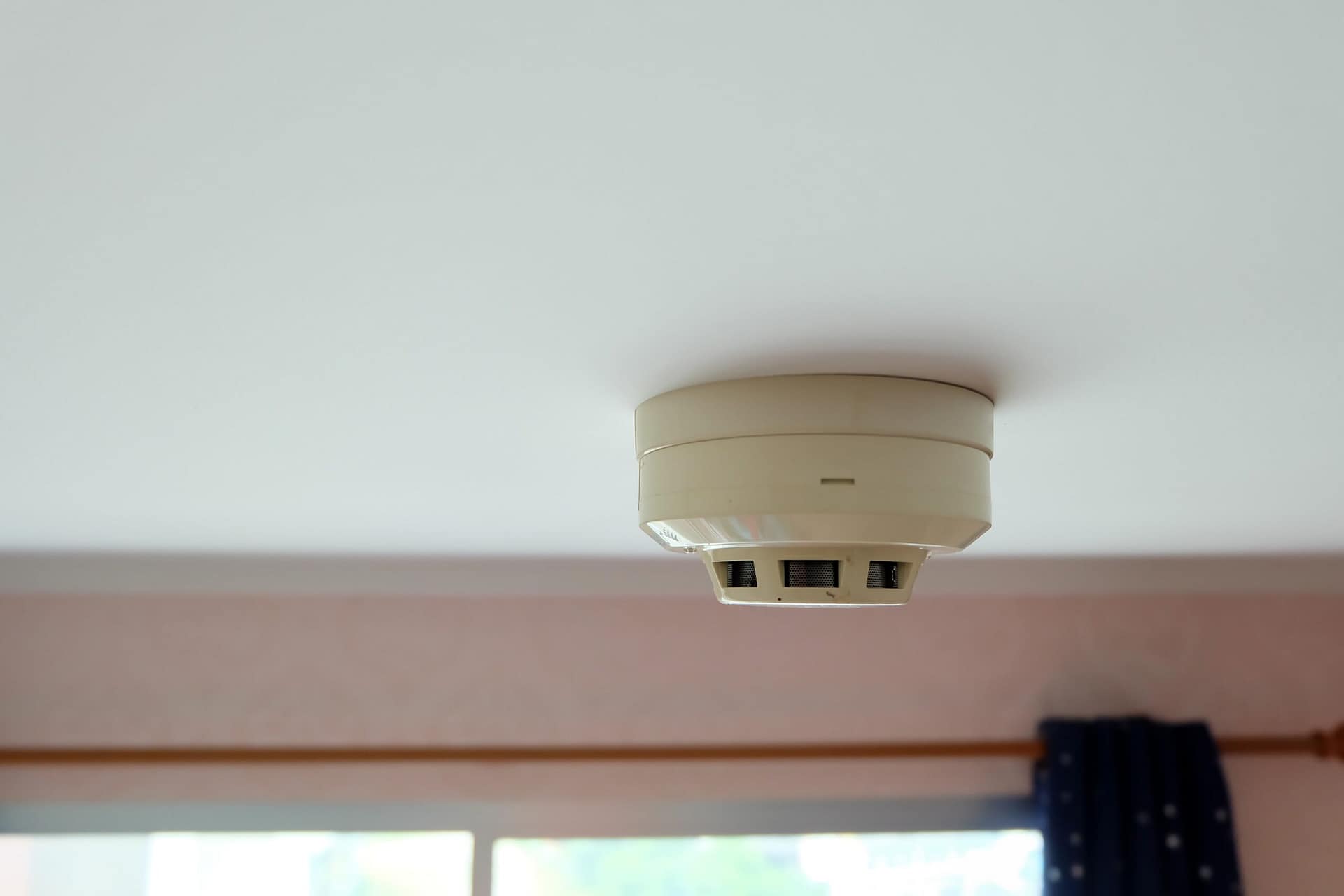 smoke-fire-detector-inside-the-condo-bedroom-sele-2025-02-03-14-41-42-utc (1)