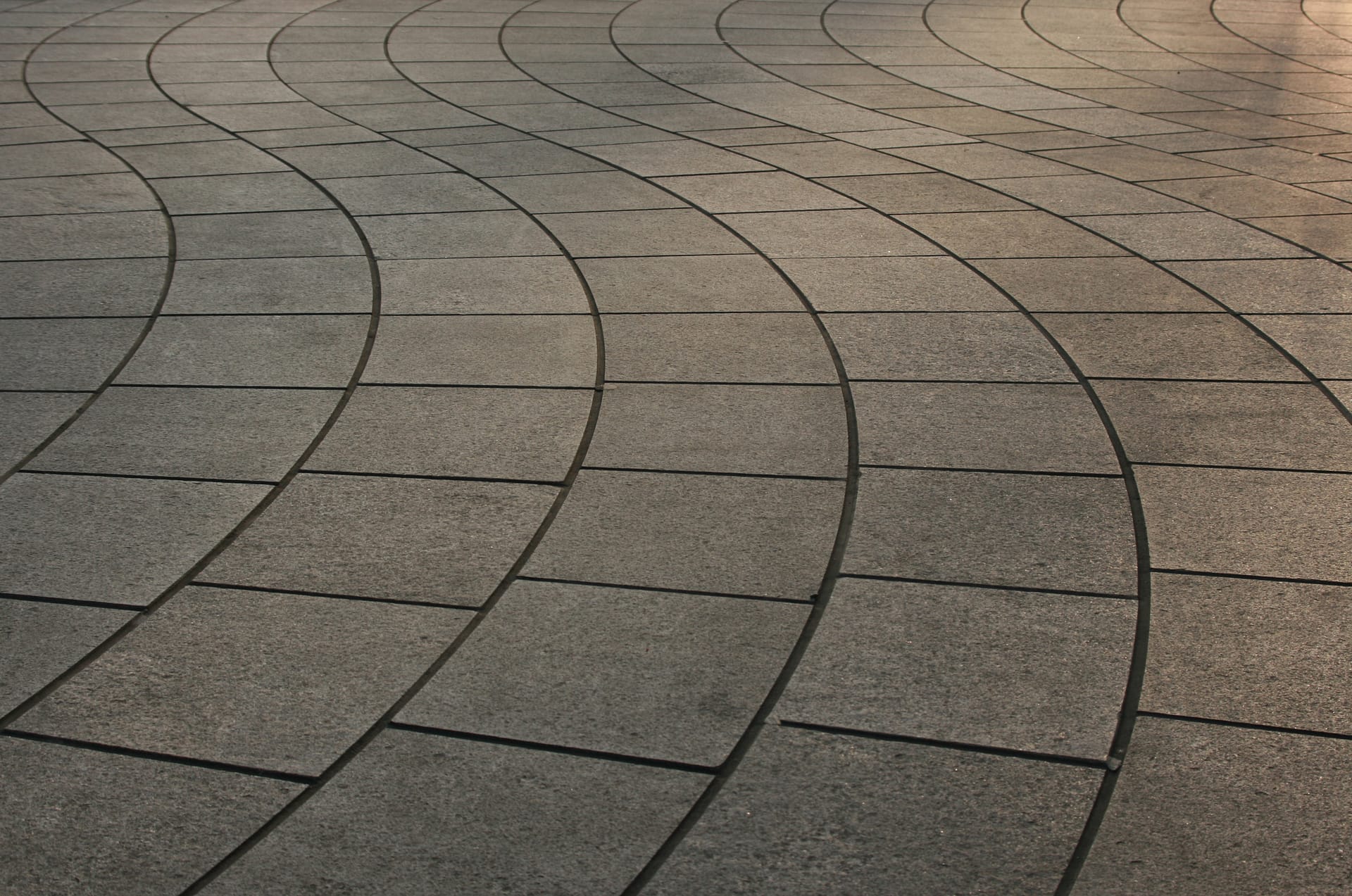 Transform Your Outdoor Space with Expert Landscaping in Cheshire 1 Curved Paving in Garden Design